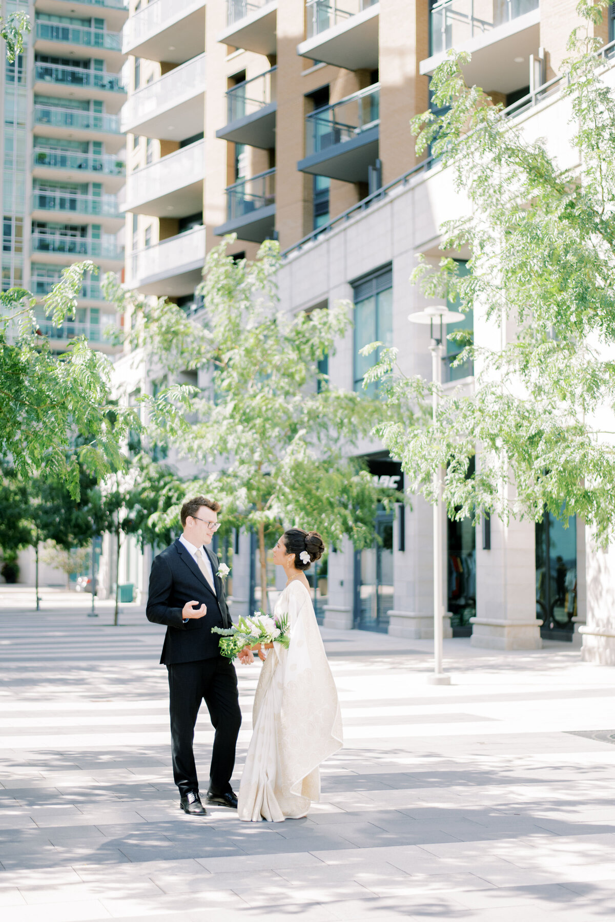 Bride and groom talking at the pearle hotel having a moment