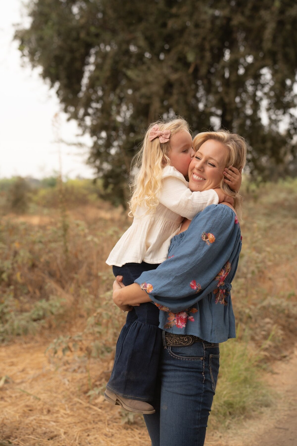 Mommy and Me girl hugging her mom