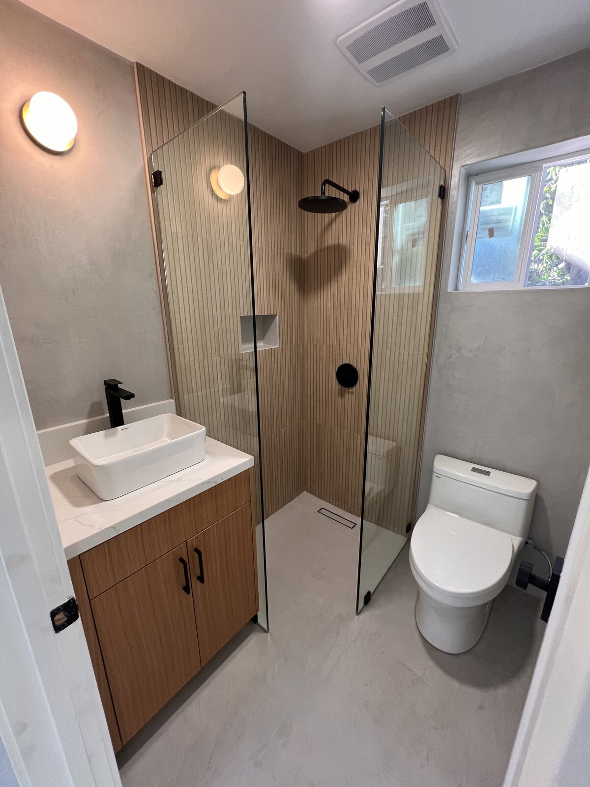 minimalist-bathroom-wood-shower-tile-floating-vanity-aw-development