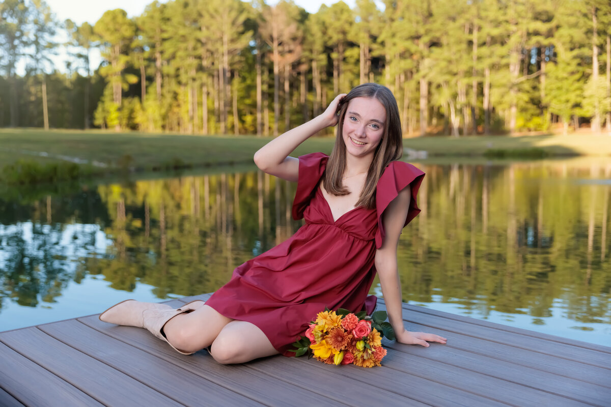 Apex Portraits by a pond in the fall for this teen.