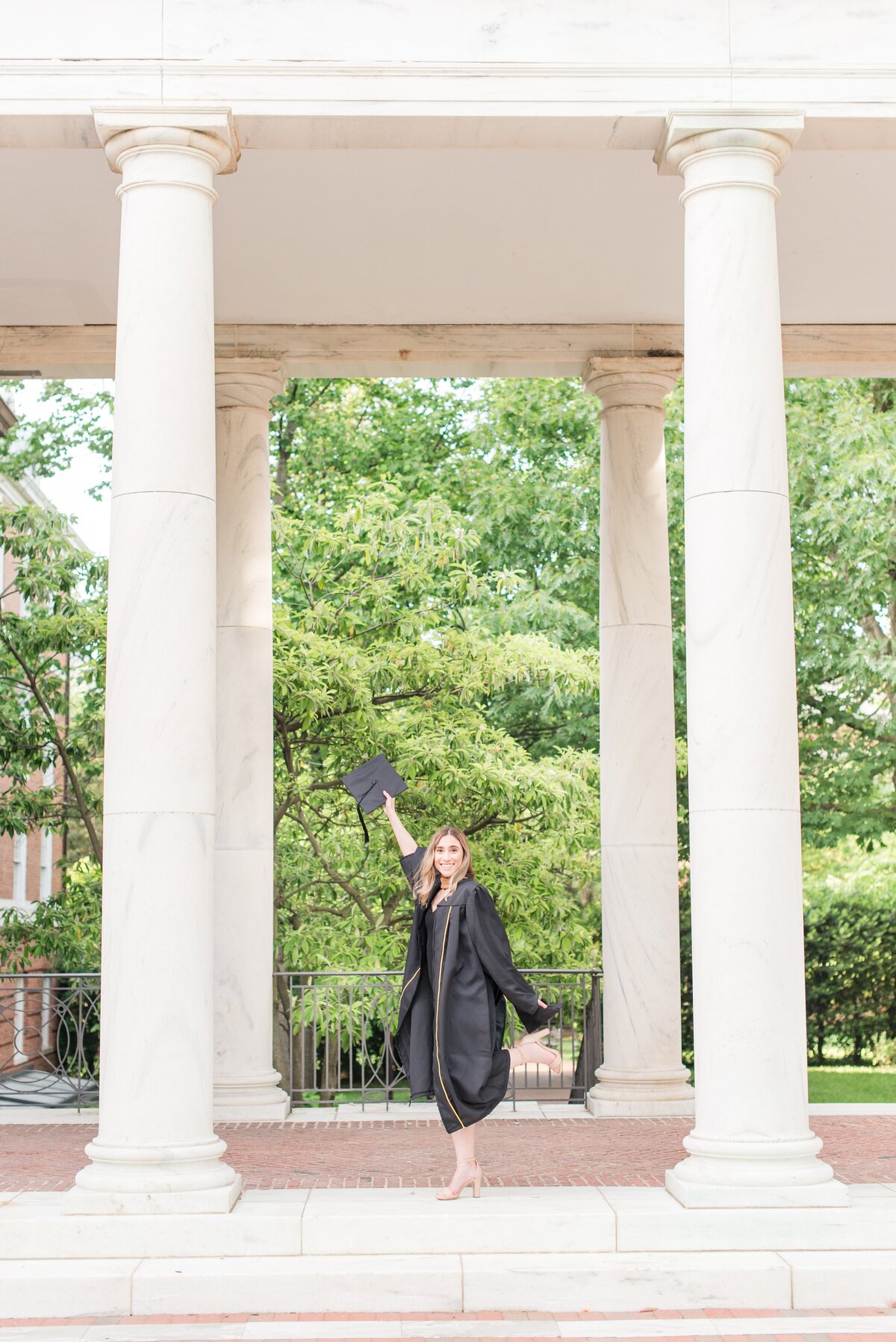 graduate in between columns at john hopkins session