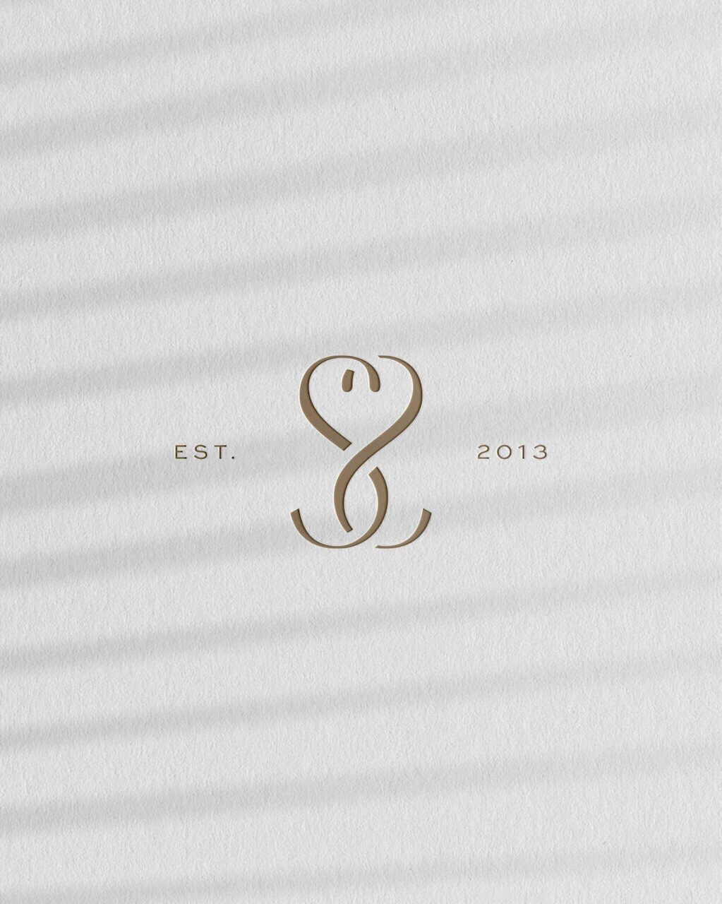 Intertwined SS monogram and logo