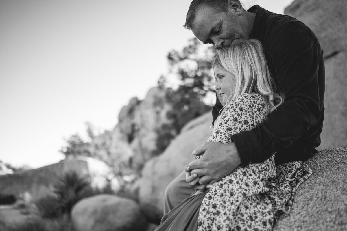 Father and daughter in. a park