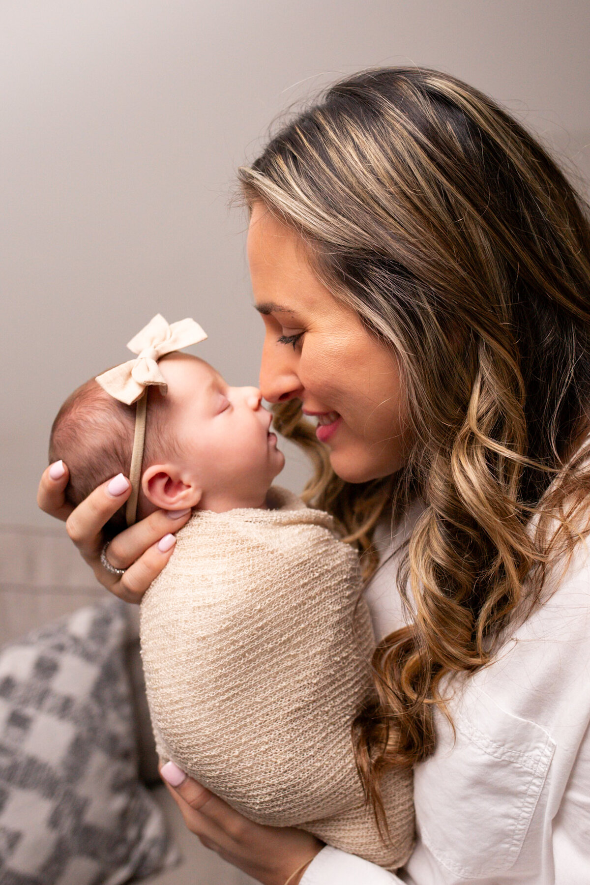 baby-snuggles-with-mom-westport-ct