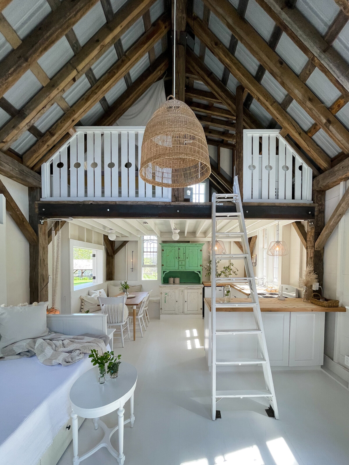 cabin living area loft with ladder