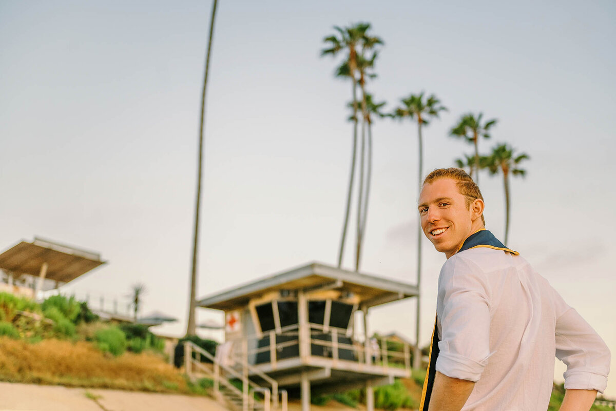 Cap and gown photos at sunset at La Jolla Shores beach