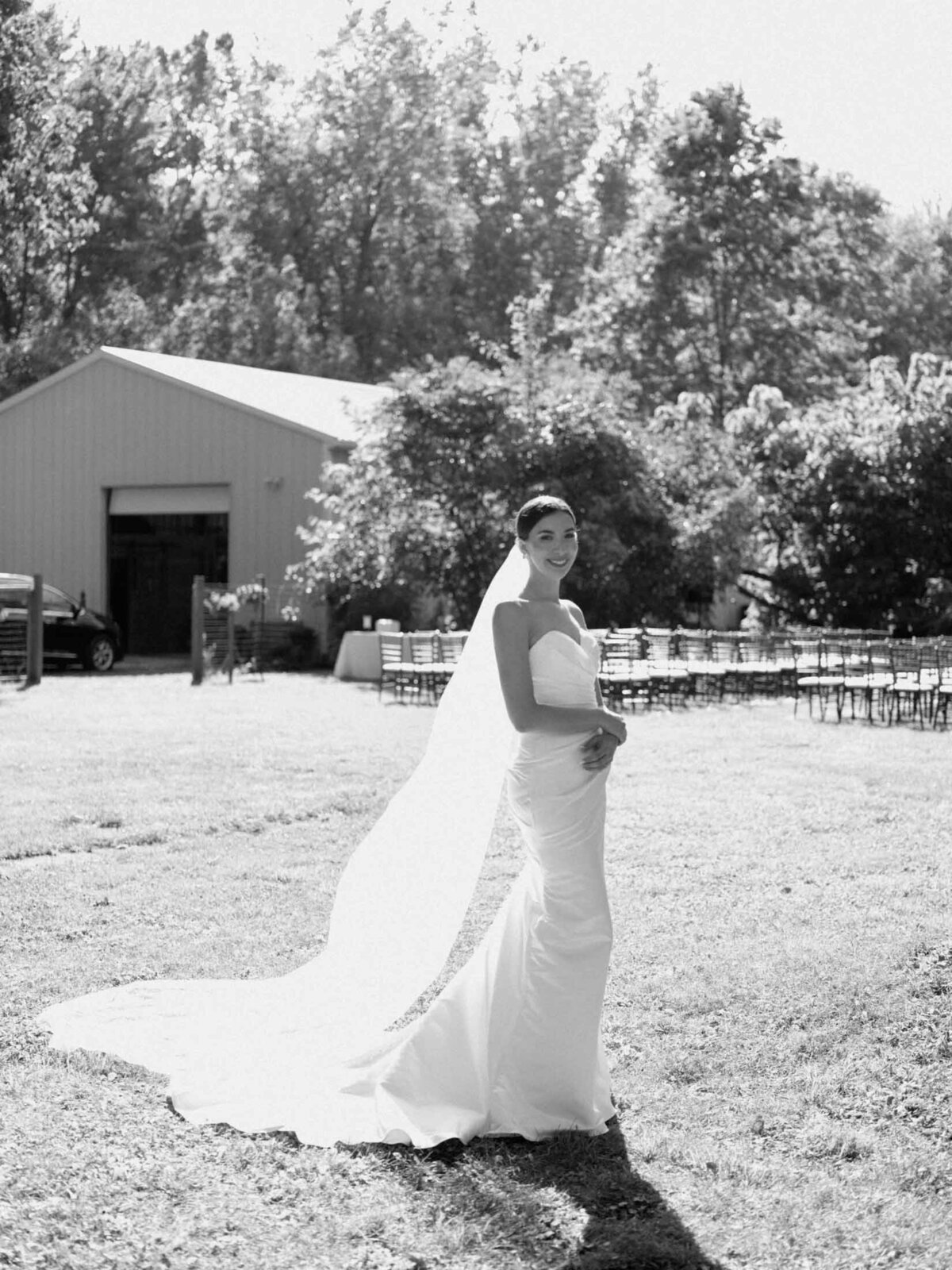 Bride in elegant Maggie Sottero gown at her backyard wedding