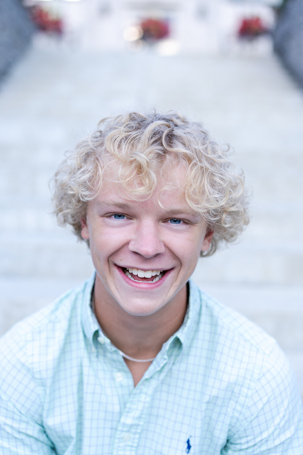 Canal Winchester senior, Ryan Hawk,  laughs at the camera on the steps at Jeffrey Mansion in Bexley, Ohio.