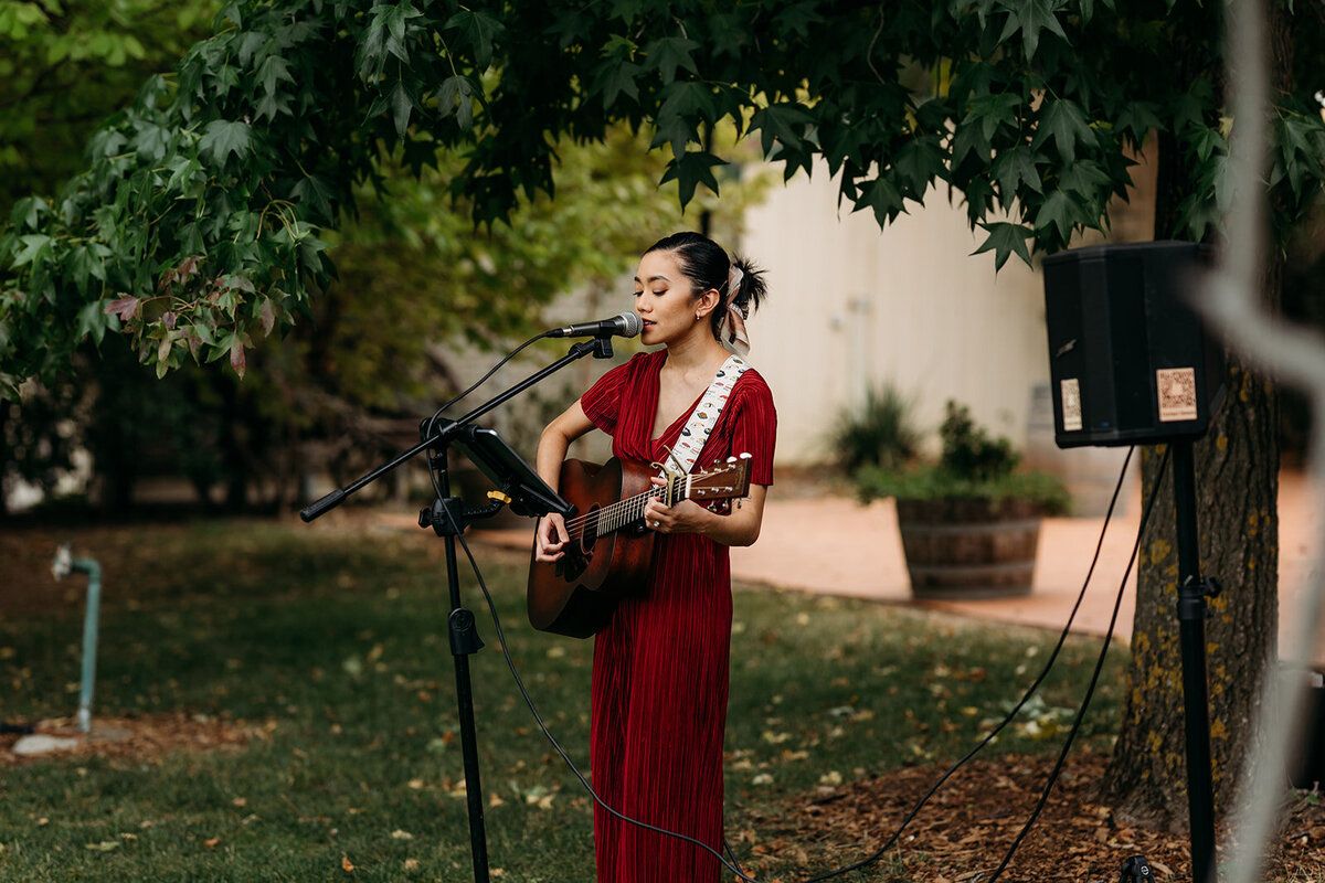 Mickey Sulit playing acoustic music at a wedding ceremony at Poachers Pantry, near Canberra ACT