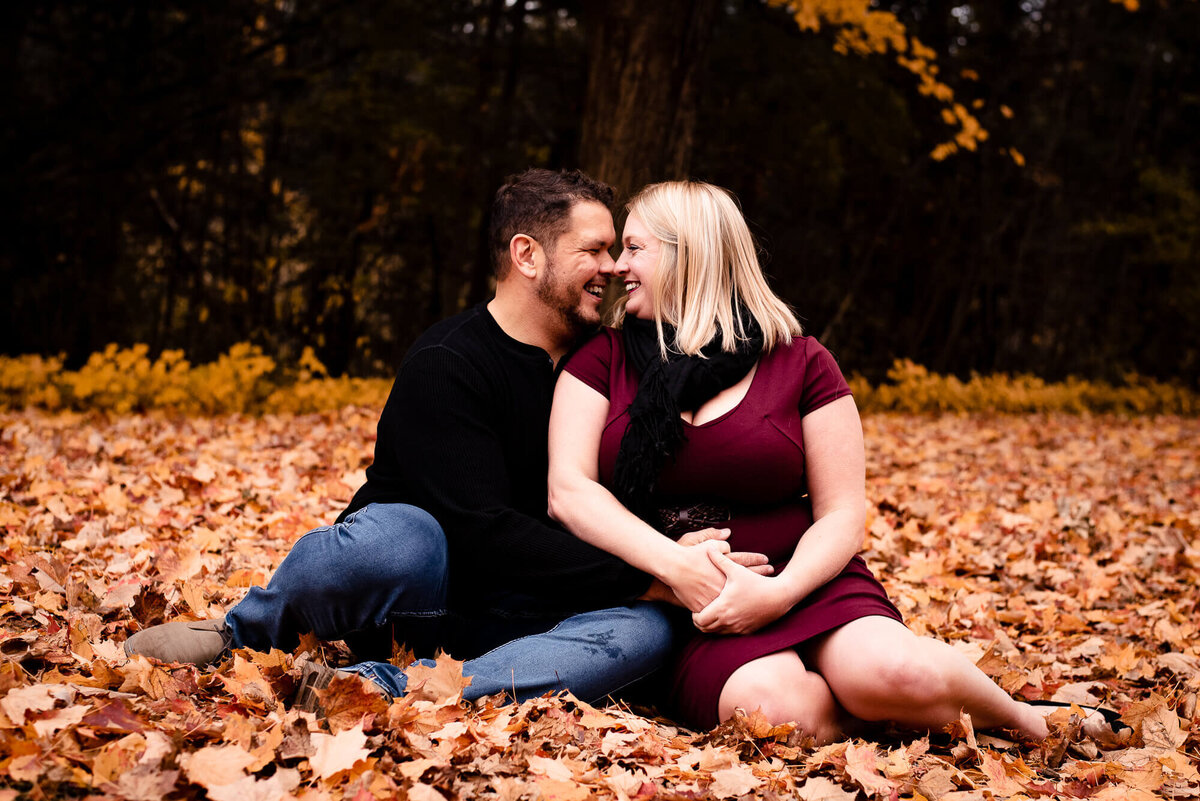 Parents sharing a kiss at Toronto family photographer session
