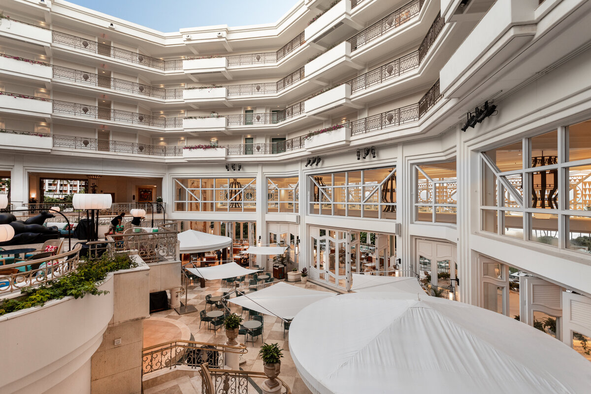 The open air atrium of the Grand Wailea, Maui, showing the full space of the newly renovated 'Ikena restaurant.
