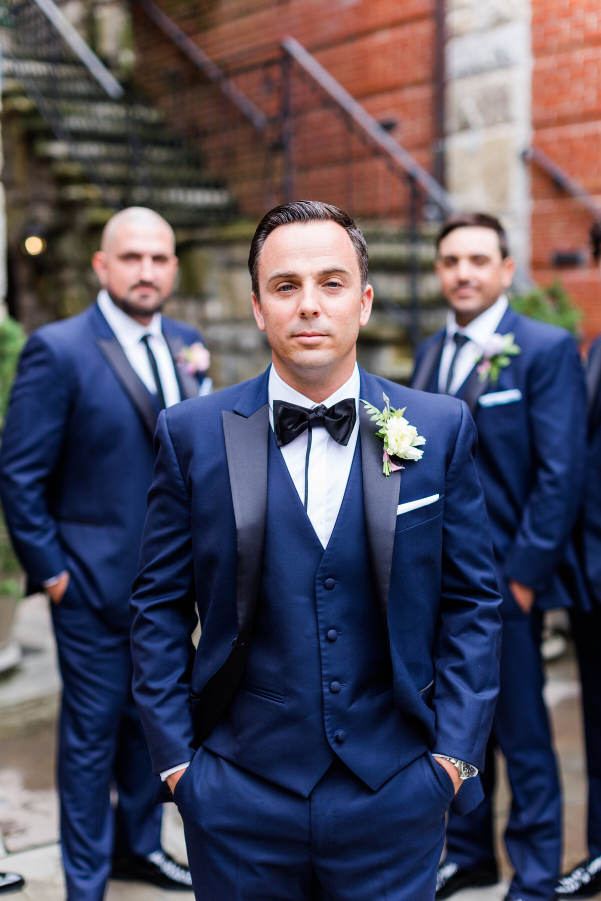 groom with groomsmen before wedding at The Farm at Old Edwards