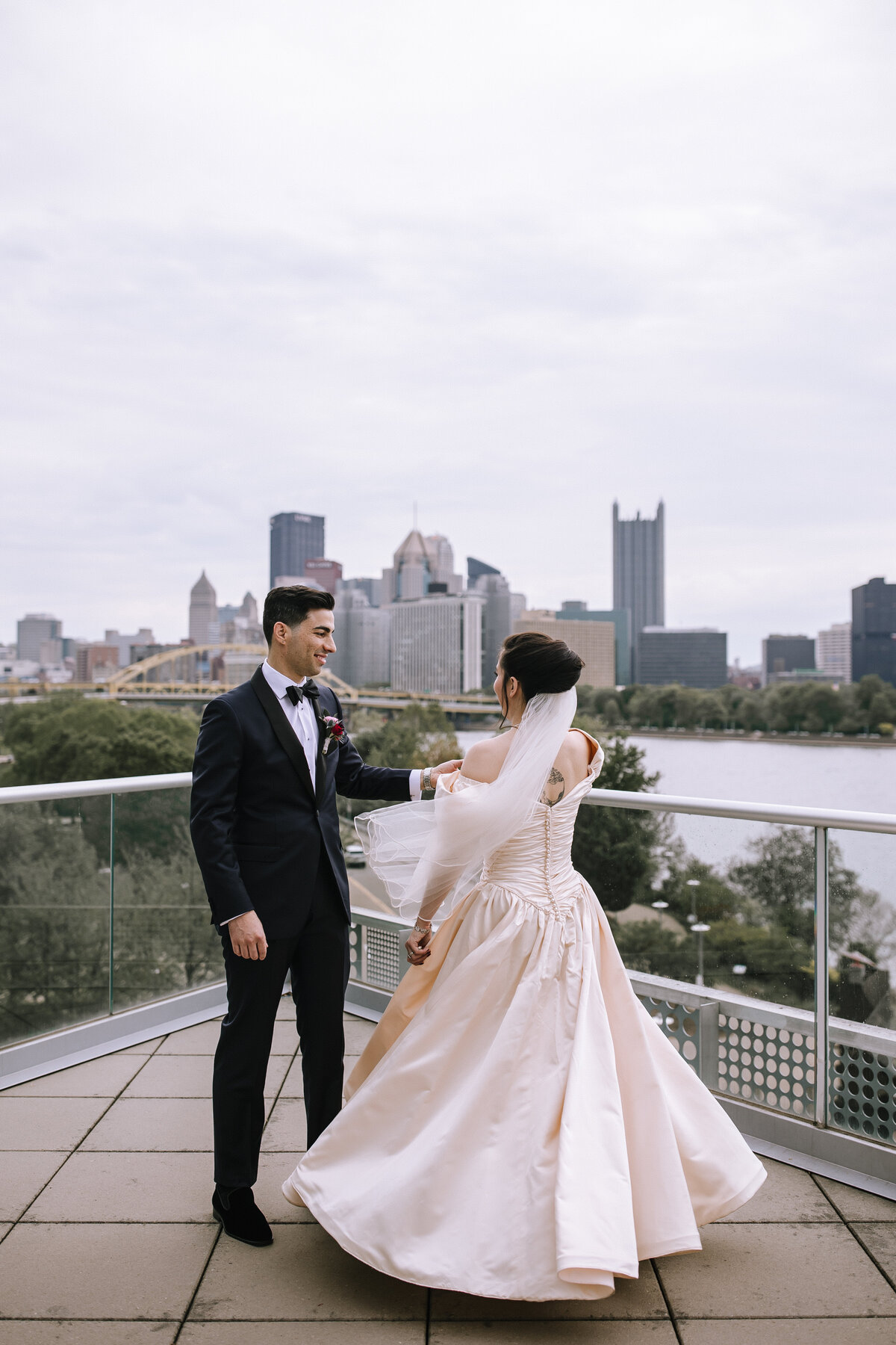 Bride and groom on the rooftop at the Carnegie Science Center wedding.