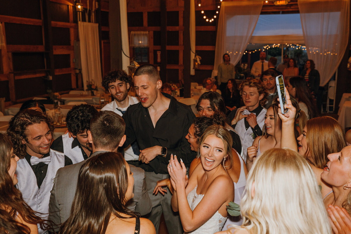 Group of young people dancing at wedding