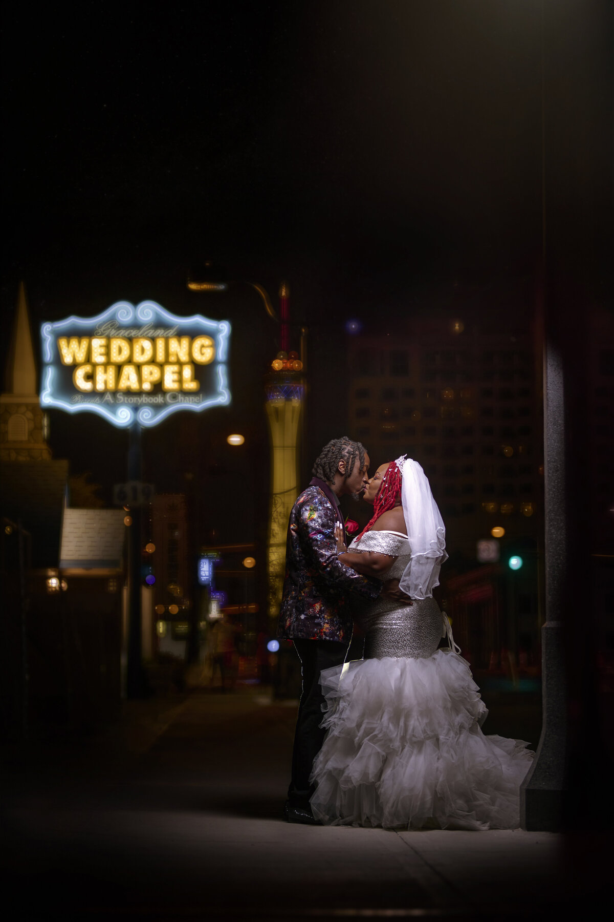 attractive black couple, recently married, celebrating marriage on the las vegas strip