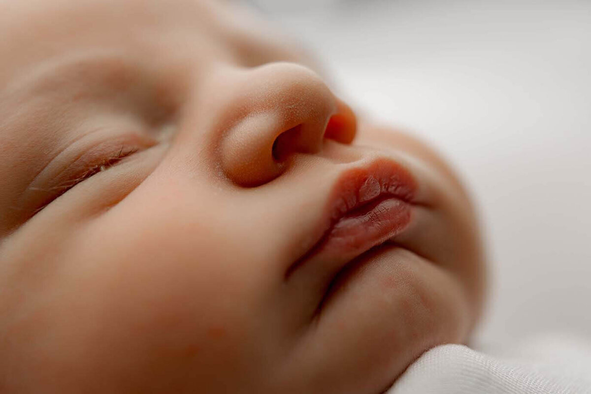 A macro shot of a newborn boys lips