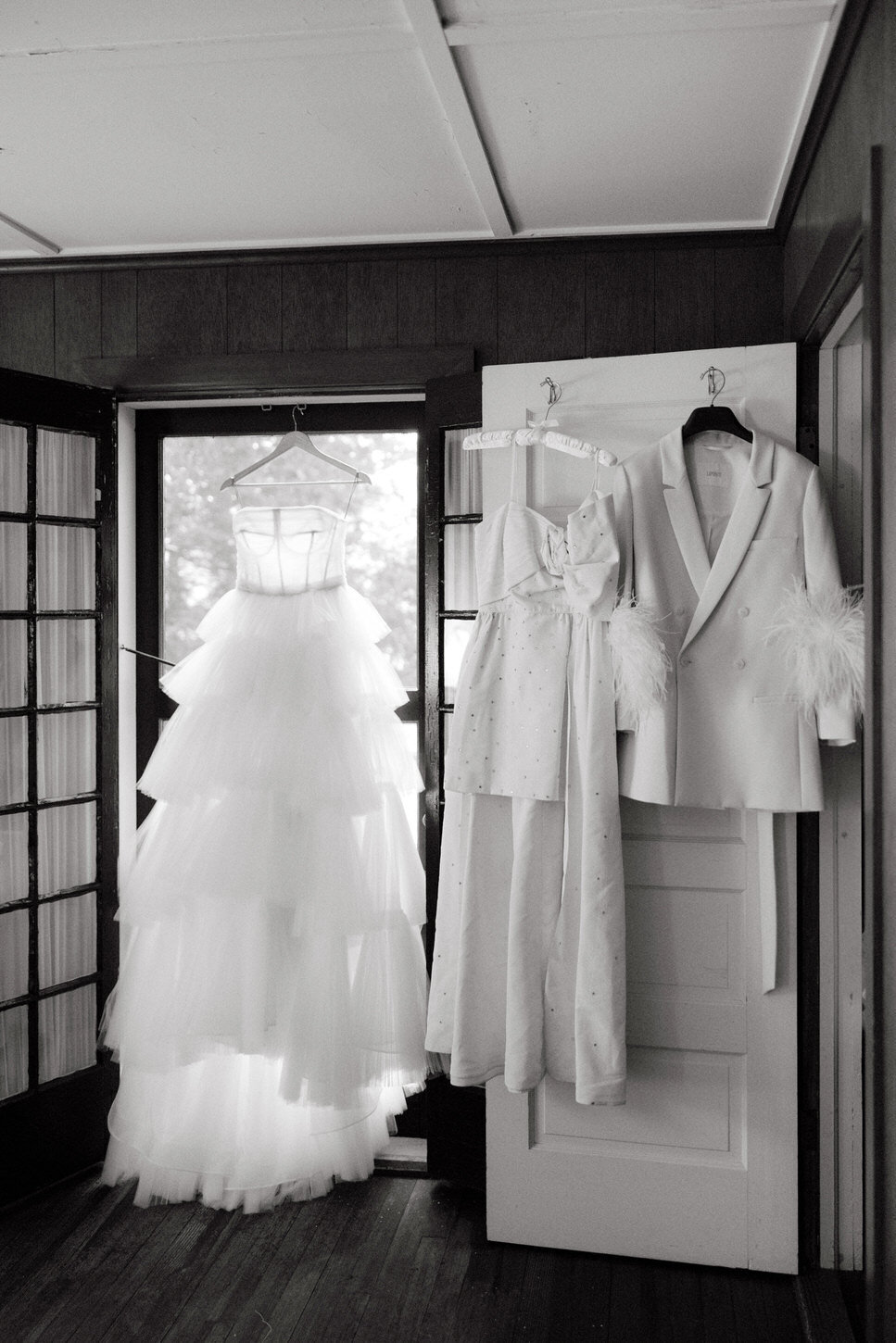 adirondack-mountain-wedding-03-collection-of-wedding-dresses-with-artistic-light-at-adirondack-mountain-wedding-jenny-fu-studio