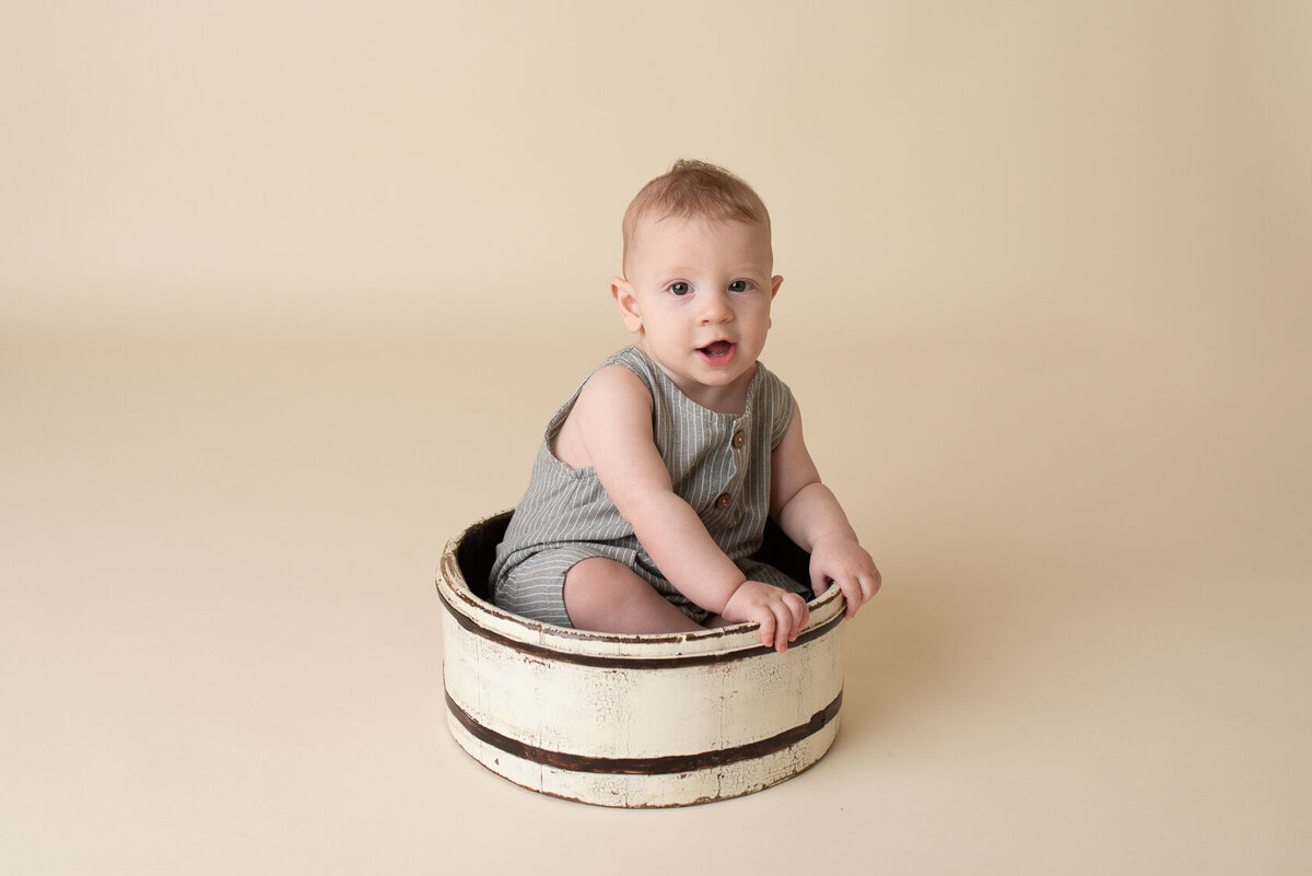 Baby in a creative boat background captured by Laura King, Houston Photographer