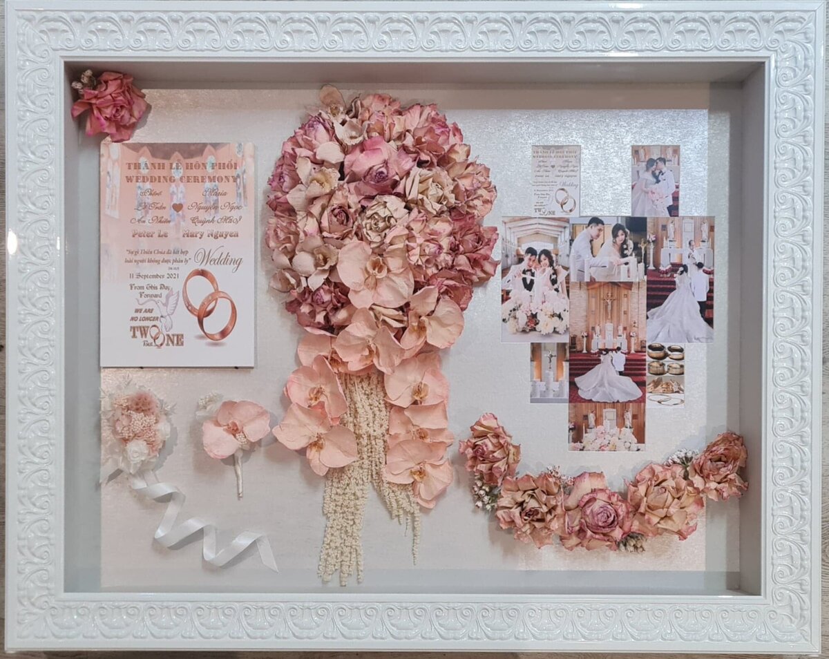 Wedding bouquet preserved in 3D frame.