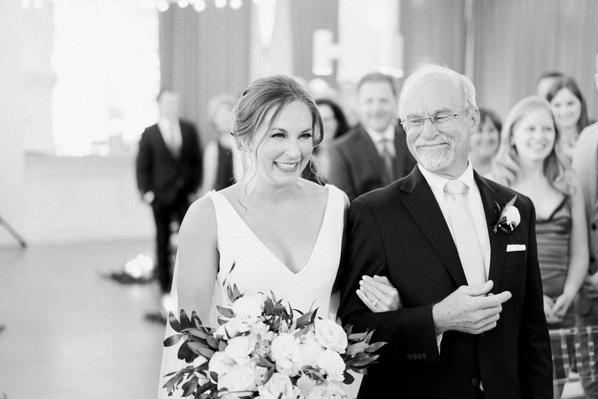 bride and father walking down aisle