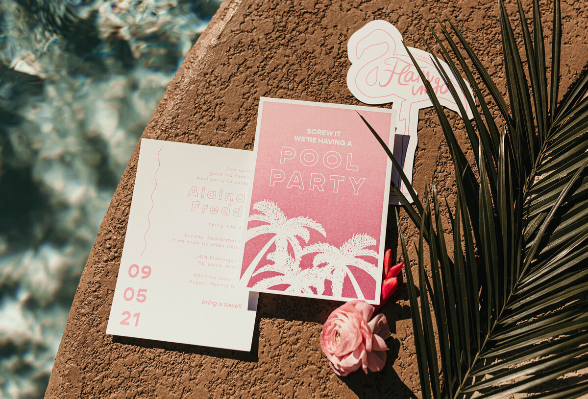 stationery flat lay pool and palm