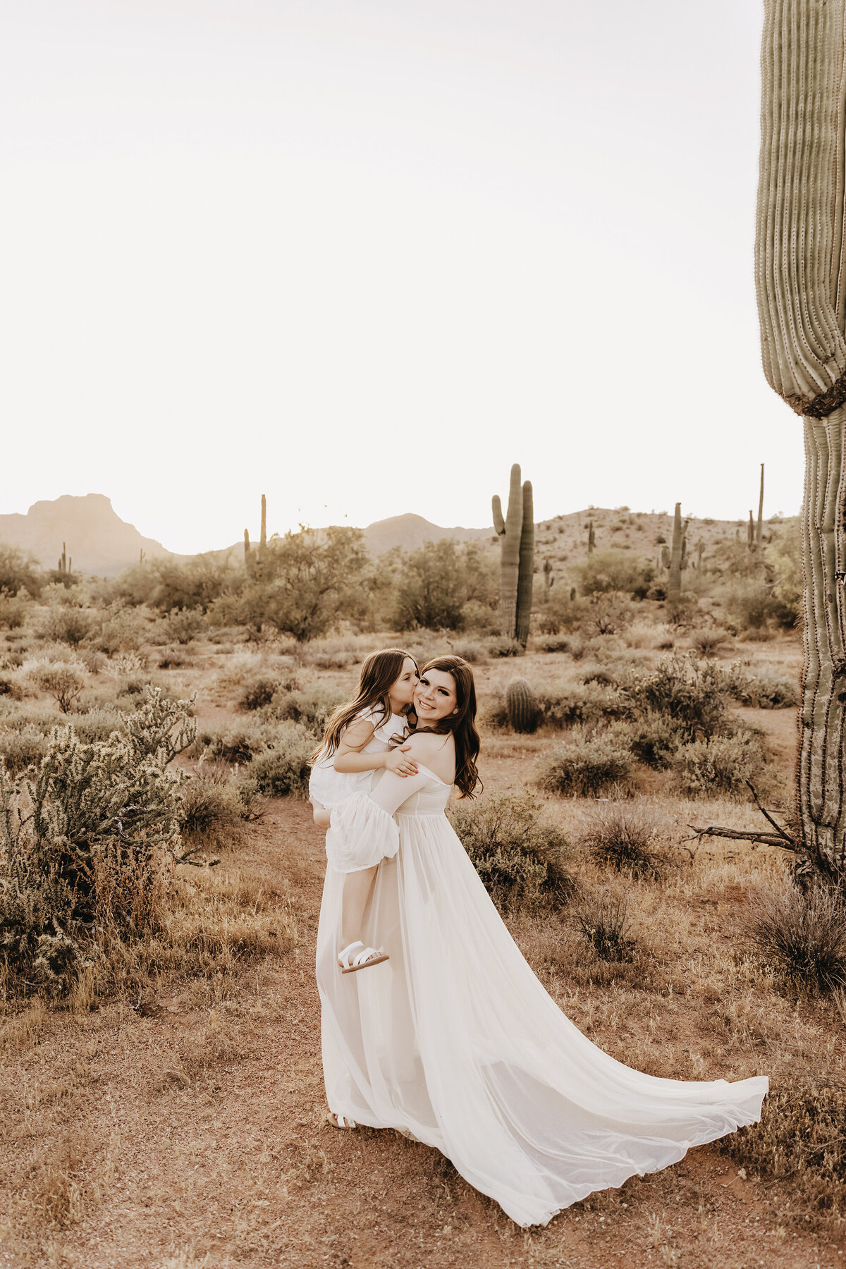 mom and daughter in phoenix desert maternity session