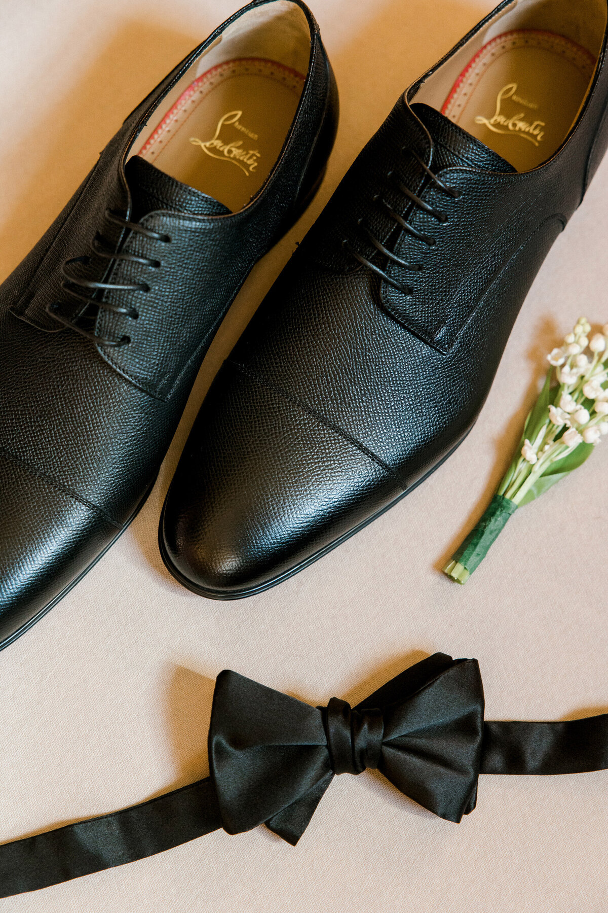 groom's shoes and bowtie details at Pendry Natirar