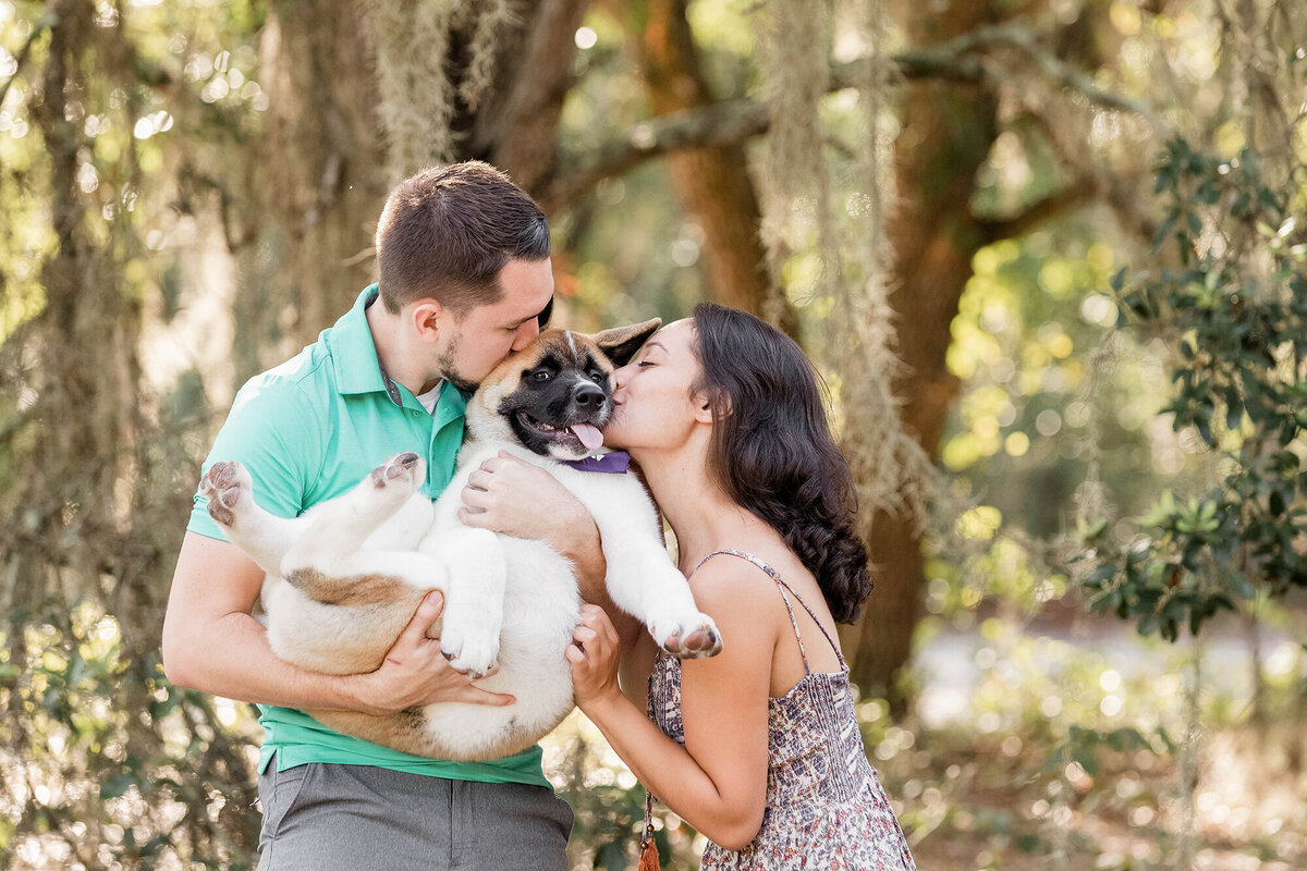 engagement portrait with a puppy at Lake Louisa State Park in Clermont Florida