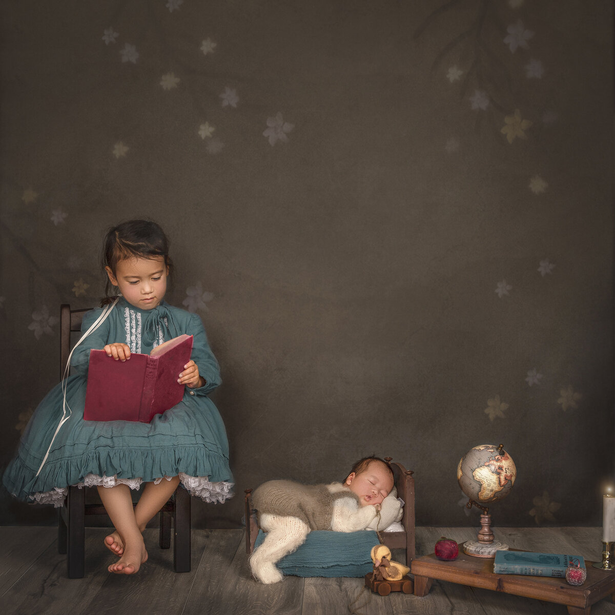 creative newborn and sibling portrait during newborn photo  shoot in ottawa Ontario