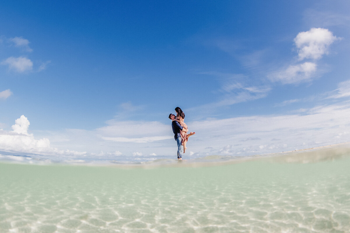 couple splashing in shallows