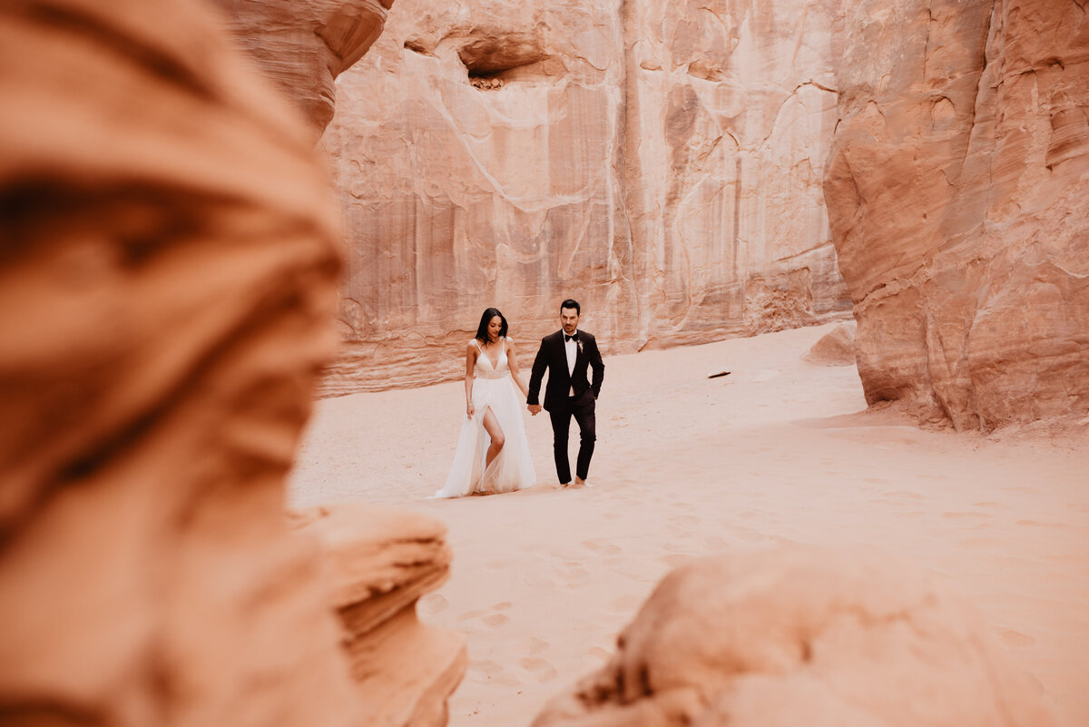 Utah elopement photographer captures bride and groom wearing wedding attire