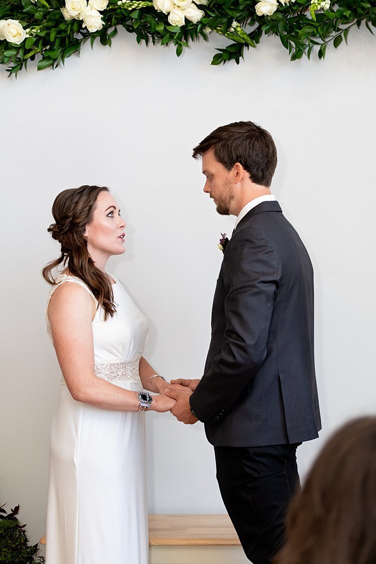 Bride and Groom exchanging vows during a self-uniting Quaker wedding ceremony in Pittsburgh, PA