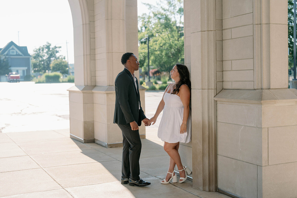 Romantic moment of fiancée resting her head on fiancé’s shoulder during Kalamazoo session.