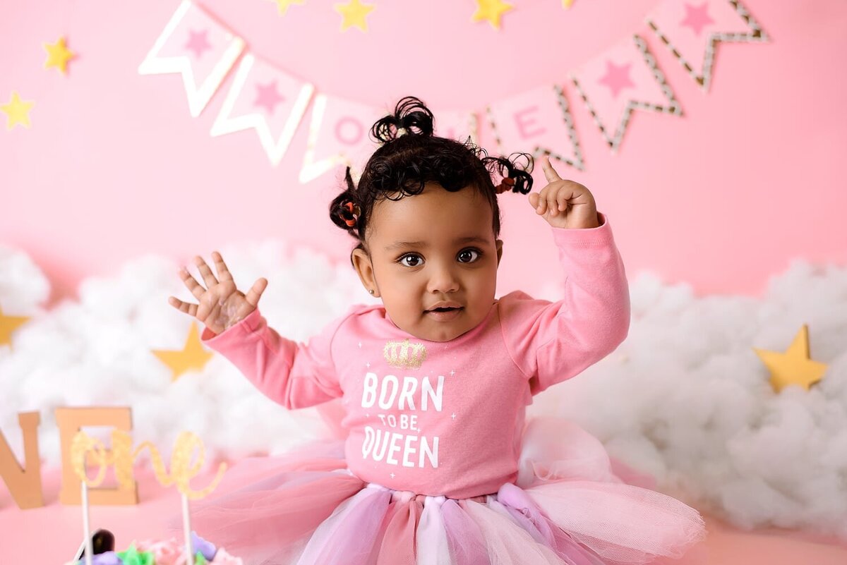 Pink and white themed clouds and stars cake smash.