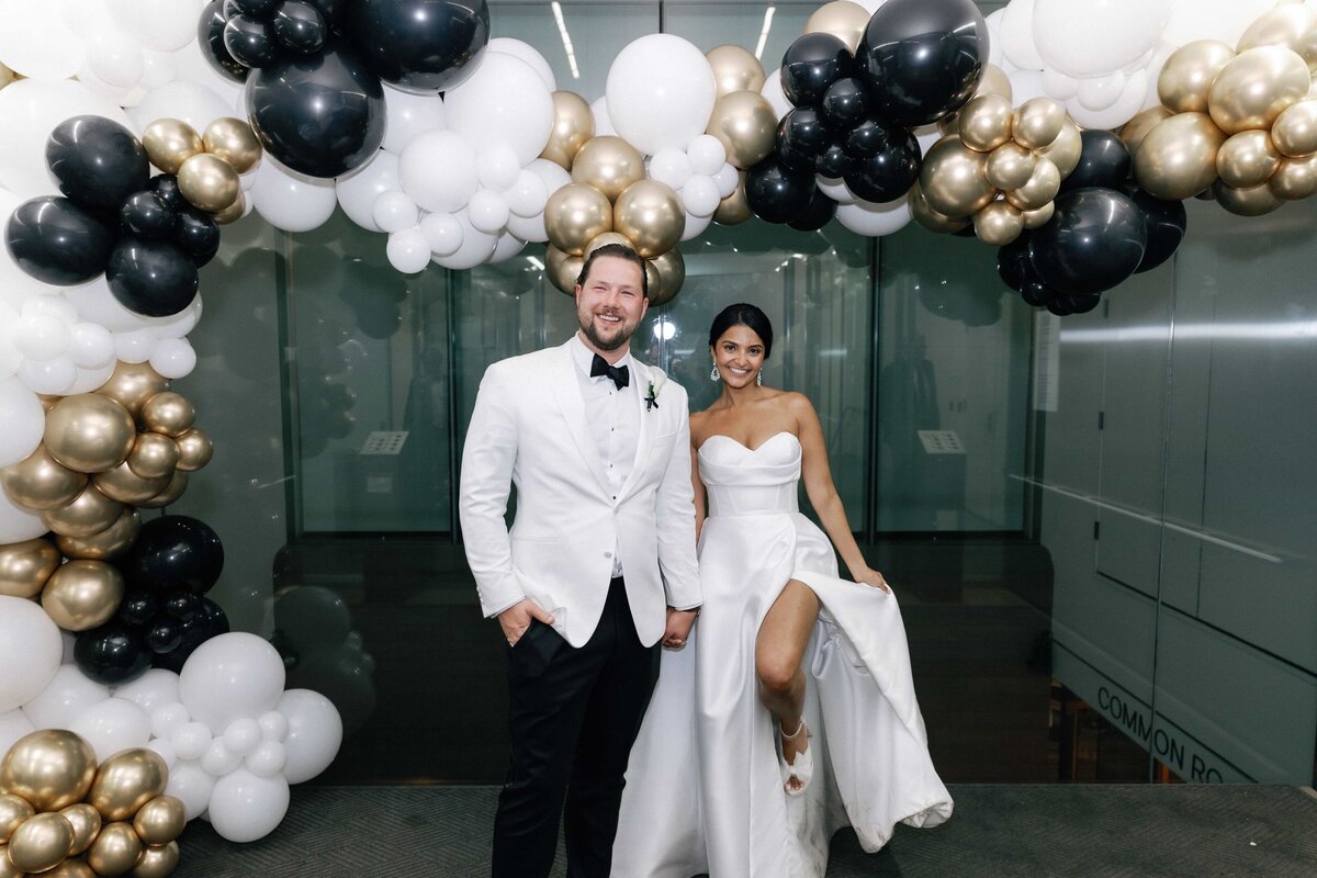 Bride and Groom with Balloon Arch