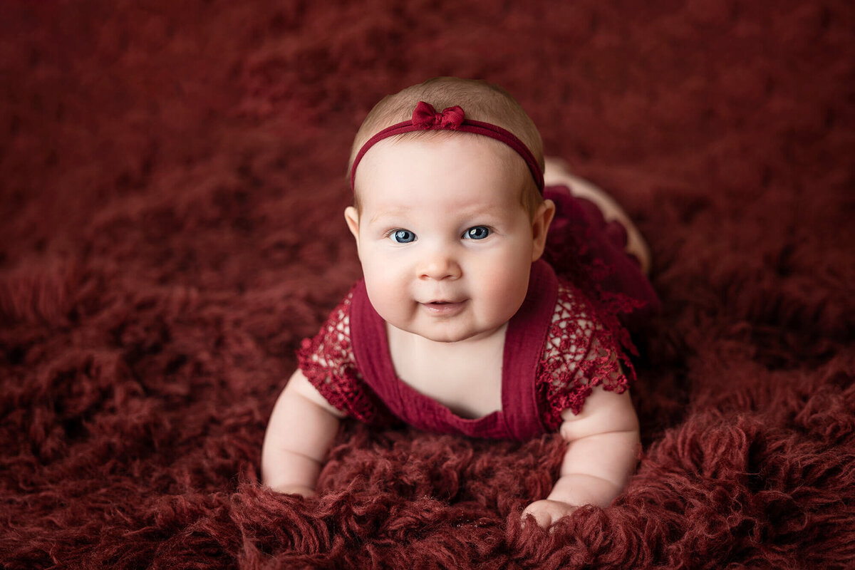 Beautiful baby girl in red.
