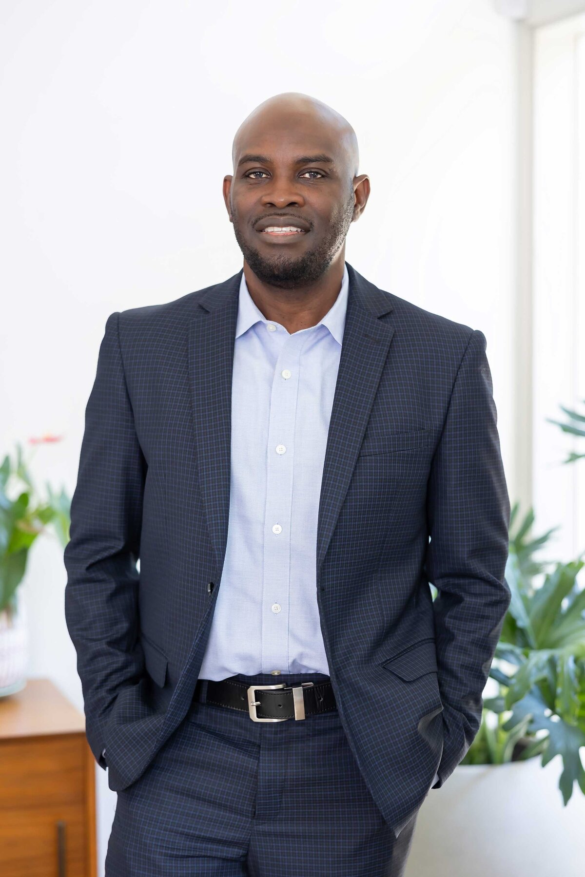Studio headshot of a man against a neutral background, part of the Headshot Gallery Portfolio by Sophie K. Hunter in Dallas