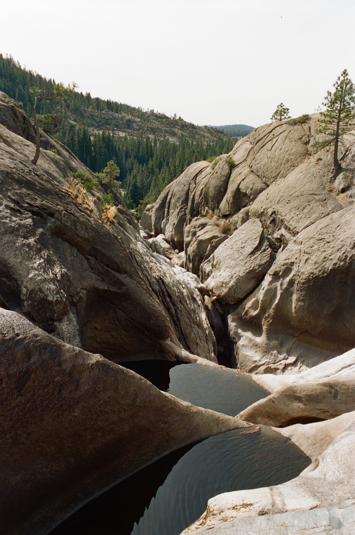 Double pools in Yosemite captured on film by Kate Winters Photography, showcasing the serene beauty of the natural landscape in an authentic, documentary style.