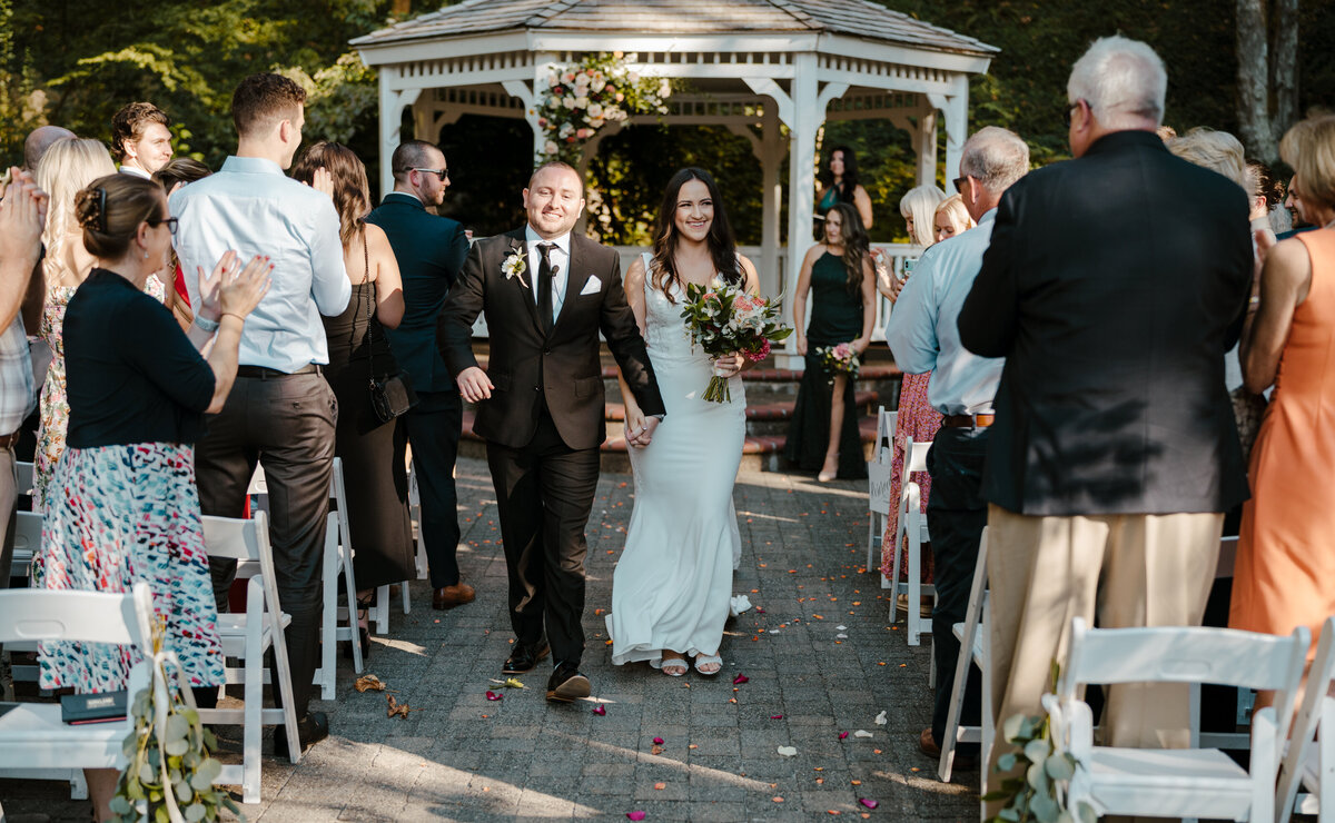 bride and groom exiting wedding ceremony
