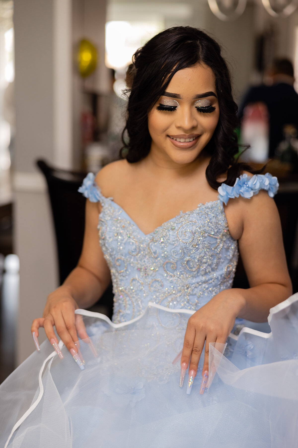 Victoria posing in her quinceañera gown at University Circle, blending her grace with Cleveland’s picturesque urban landscape