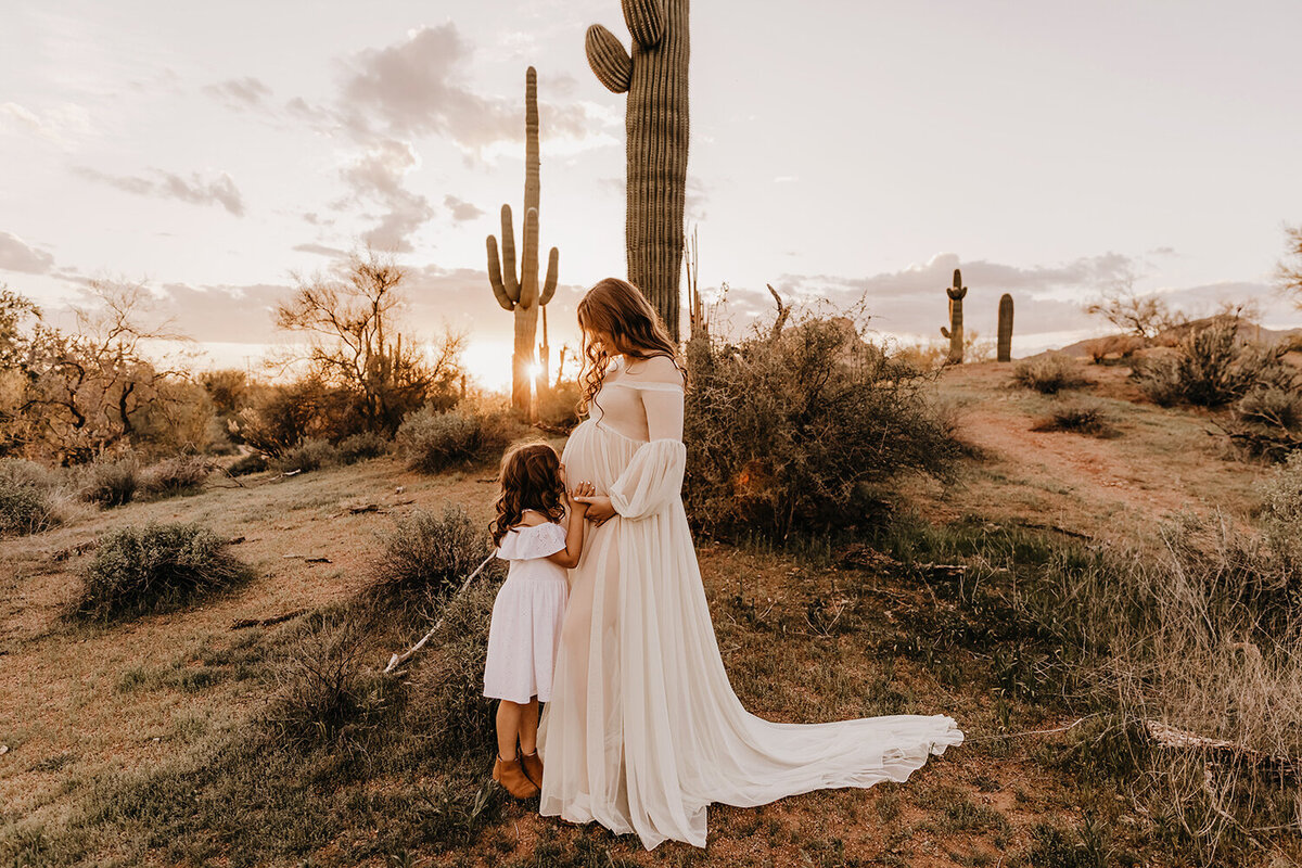 phoenix maternity session at sunset with mother and daughter in white dresses