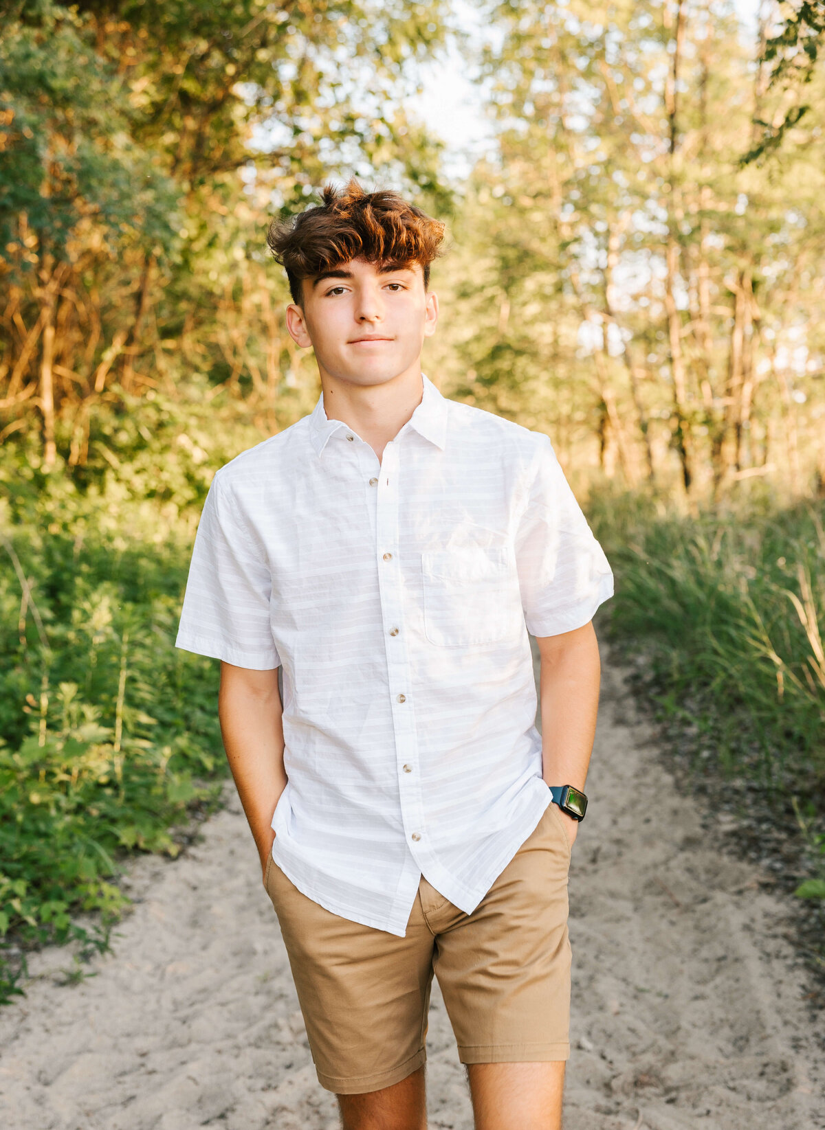 Senior portrait of a boy on Lake Erie at Presque Isle State Park
