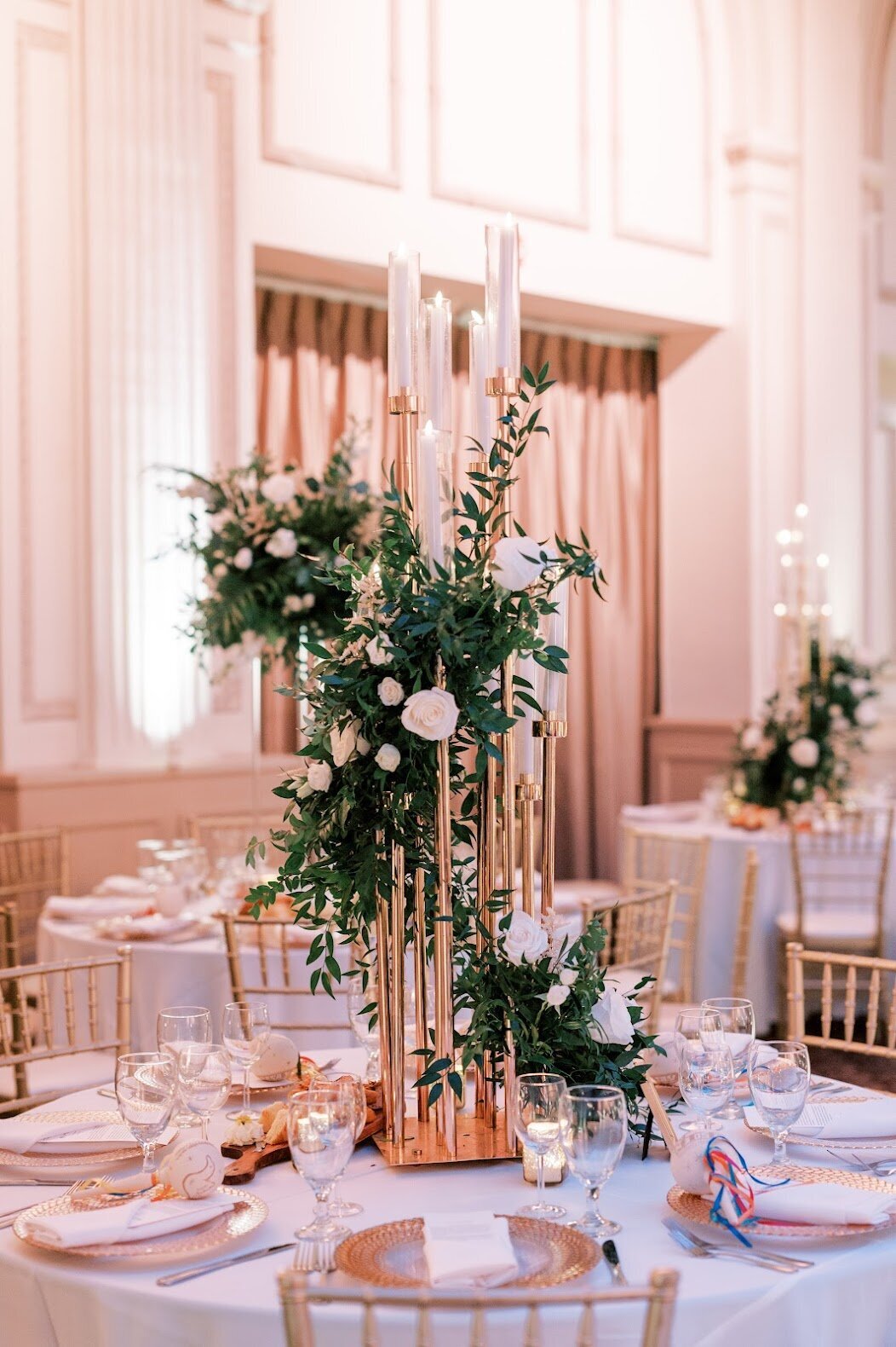 candle and floweral tall center piece