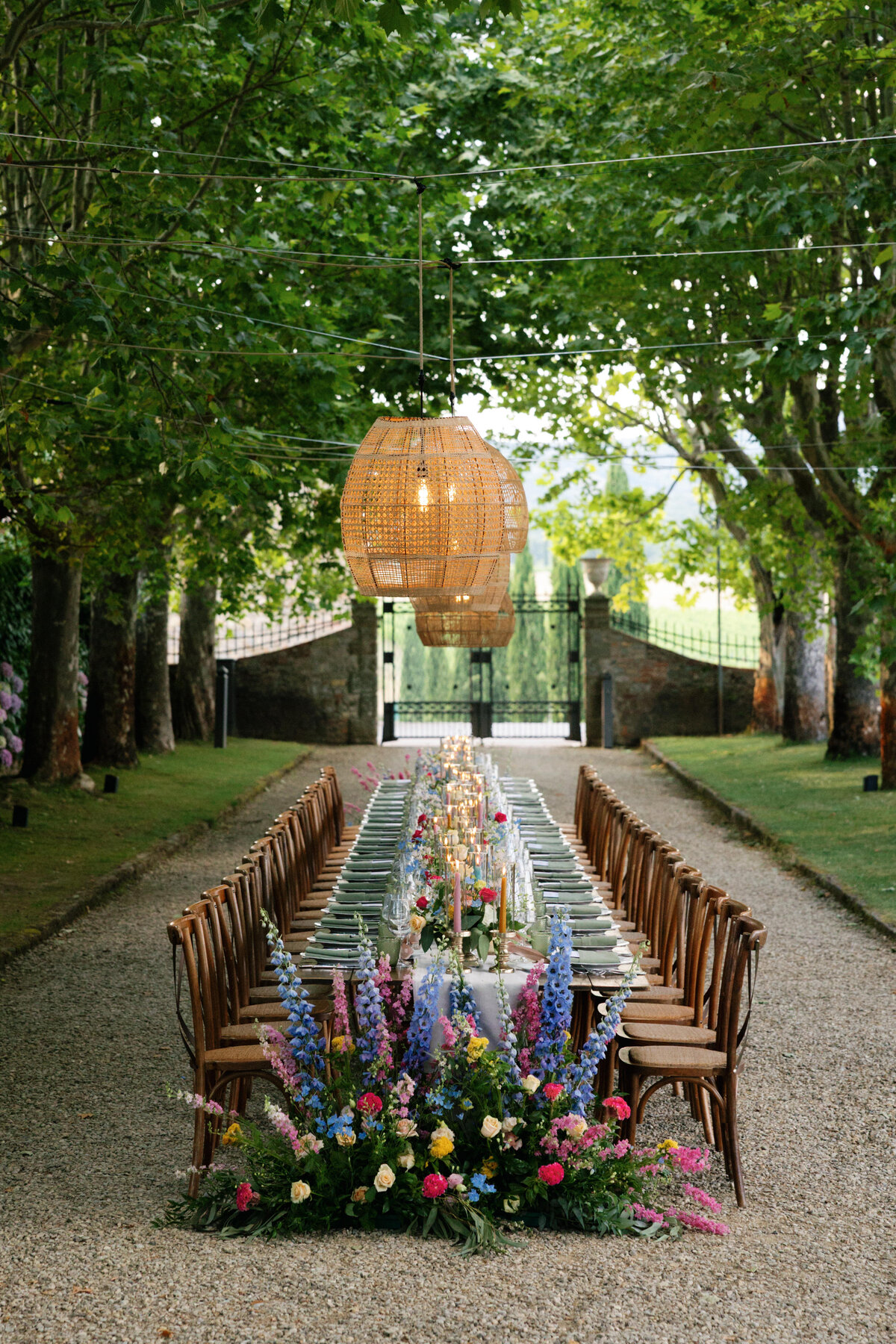 Reception table decor under twinkling lights at Villa La Selva