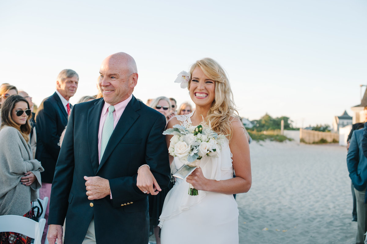 Father walks bride down aisle beach wedding