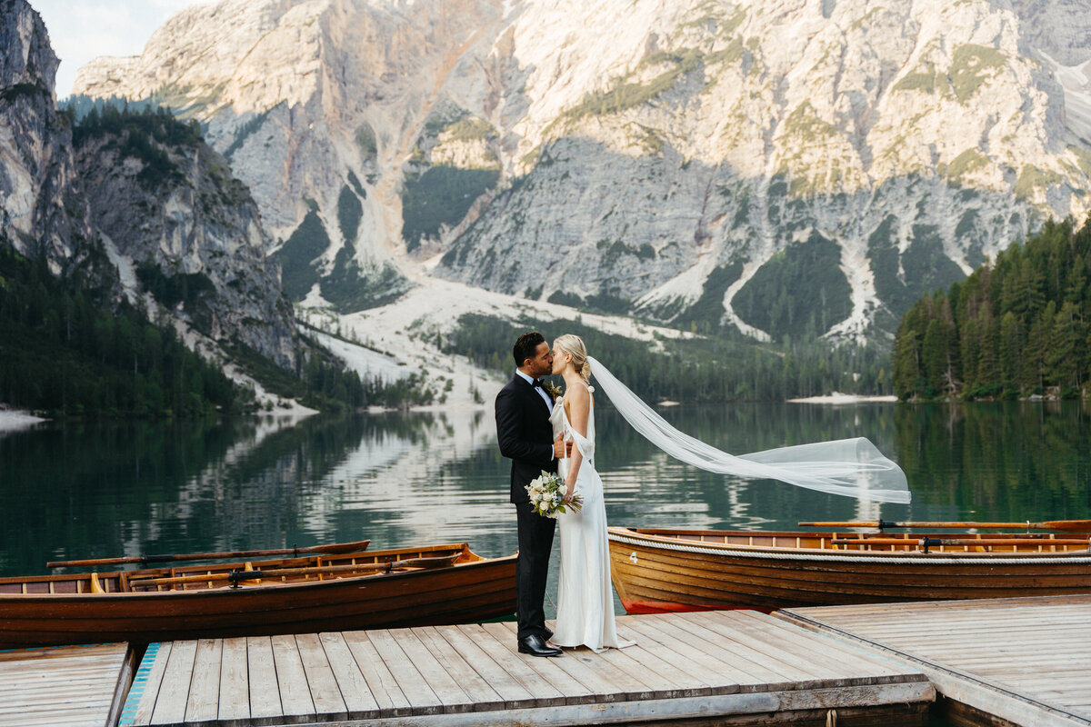 Scenic view of Lago di Braies docks surrounded by mountains