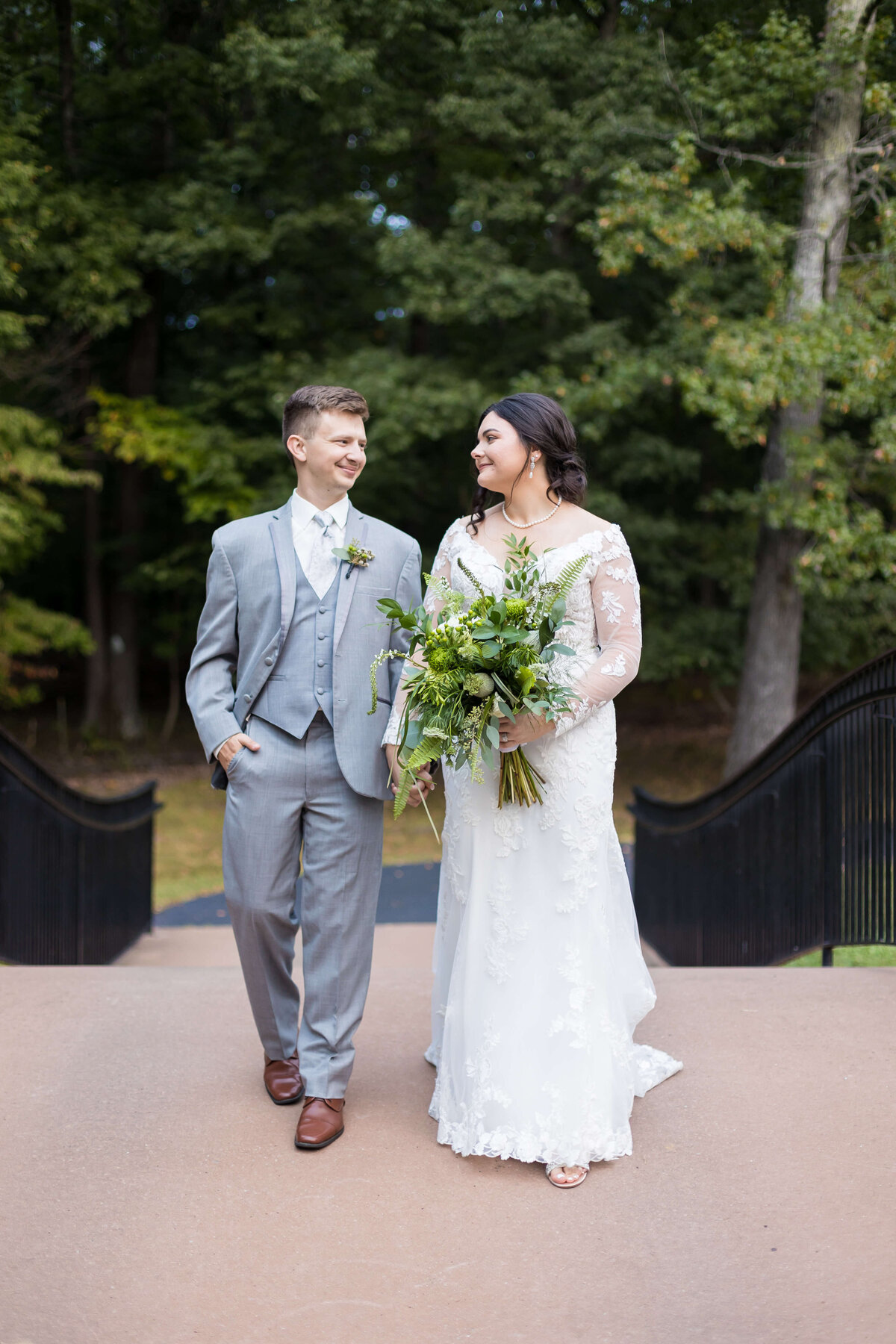 Couple walking along at wedding at Mahr Park, Tennessee