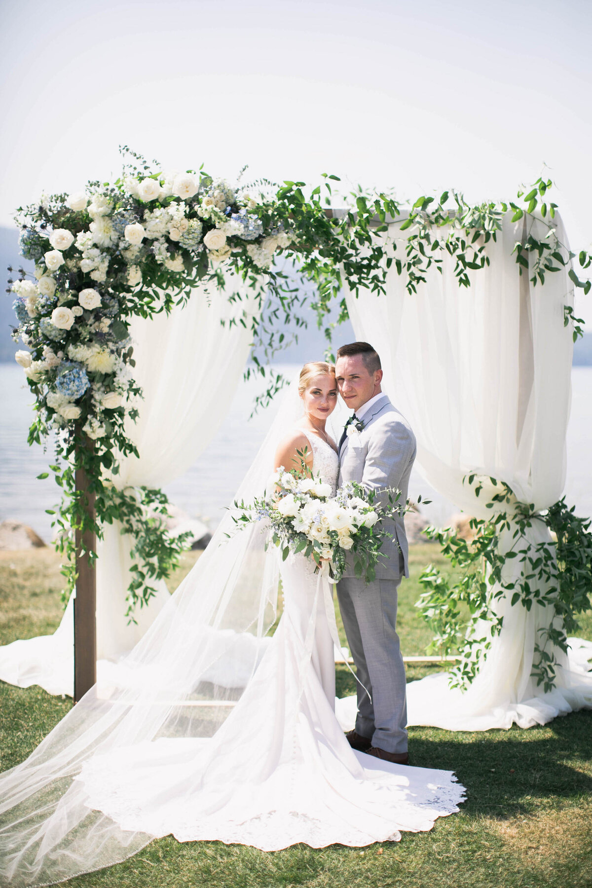 bride and groom with flowers
