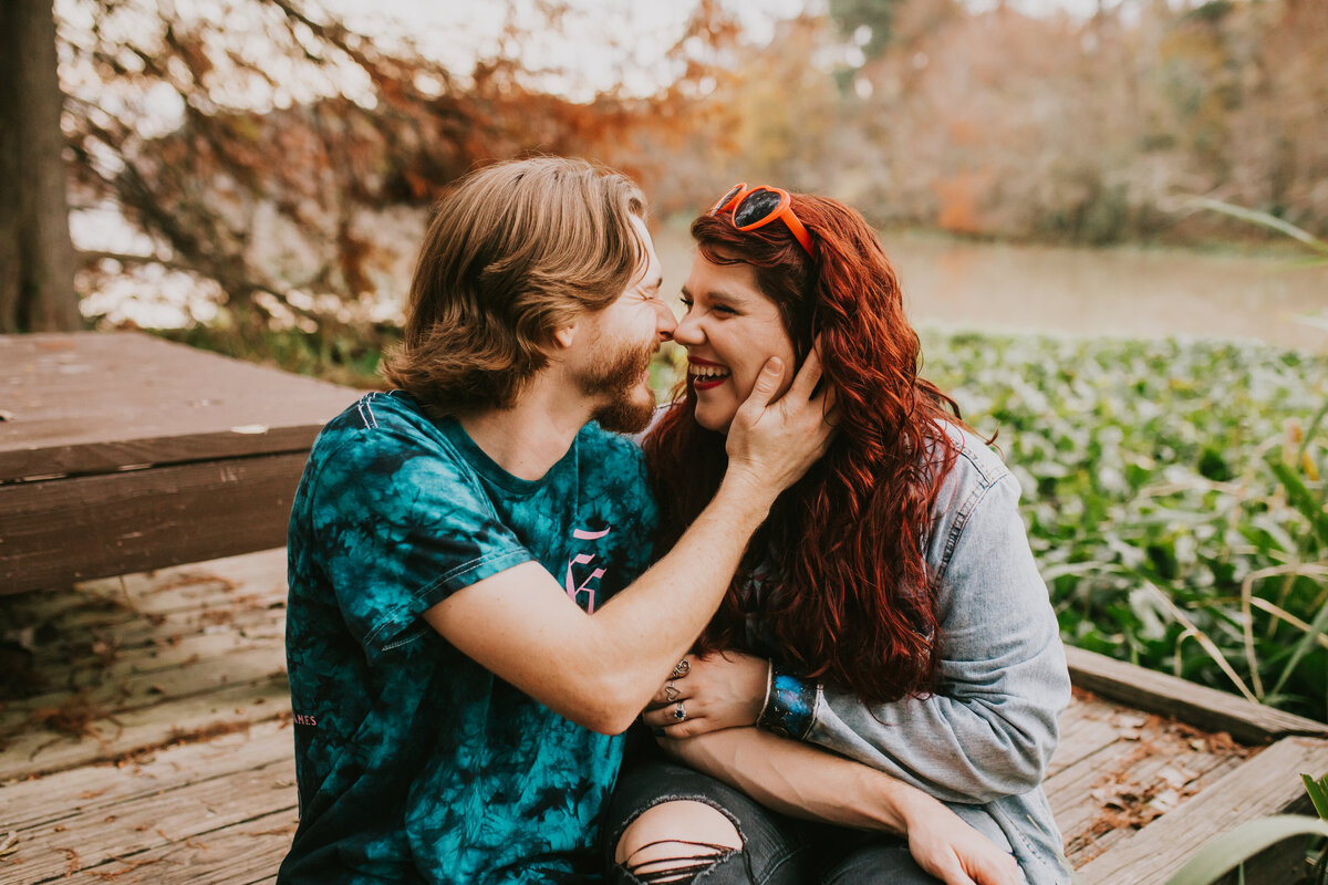 couple kissing during engagement photoshoot