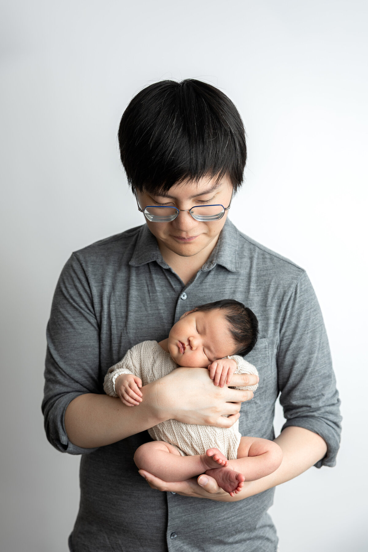 Dad and newborn baby girl Edmonton studio photography 